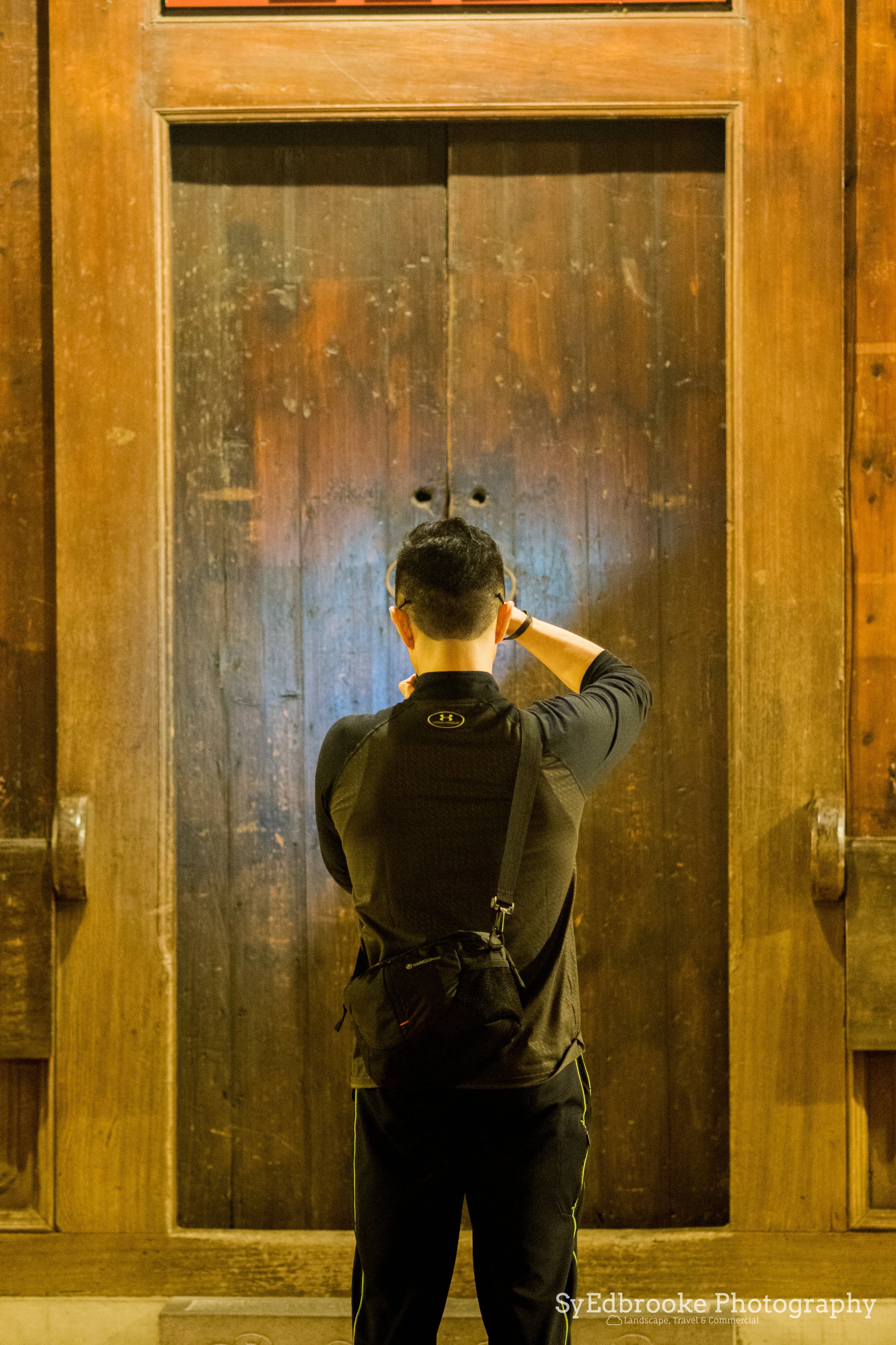 A fellow photographer friend of mine shooting the finer details. f1.8, ISO 1600, 1/5, 75mm