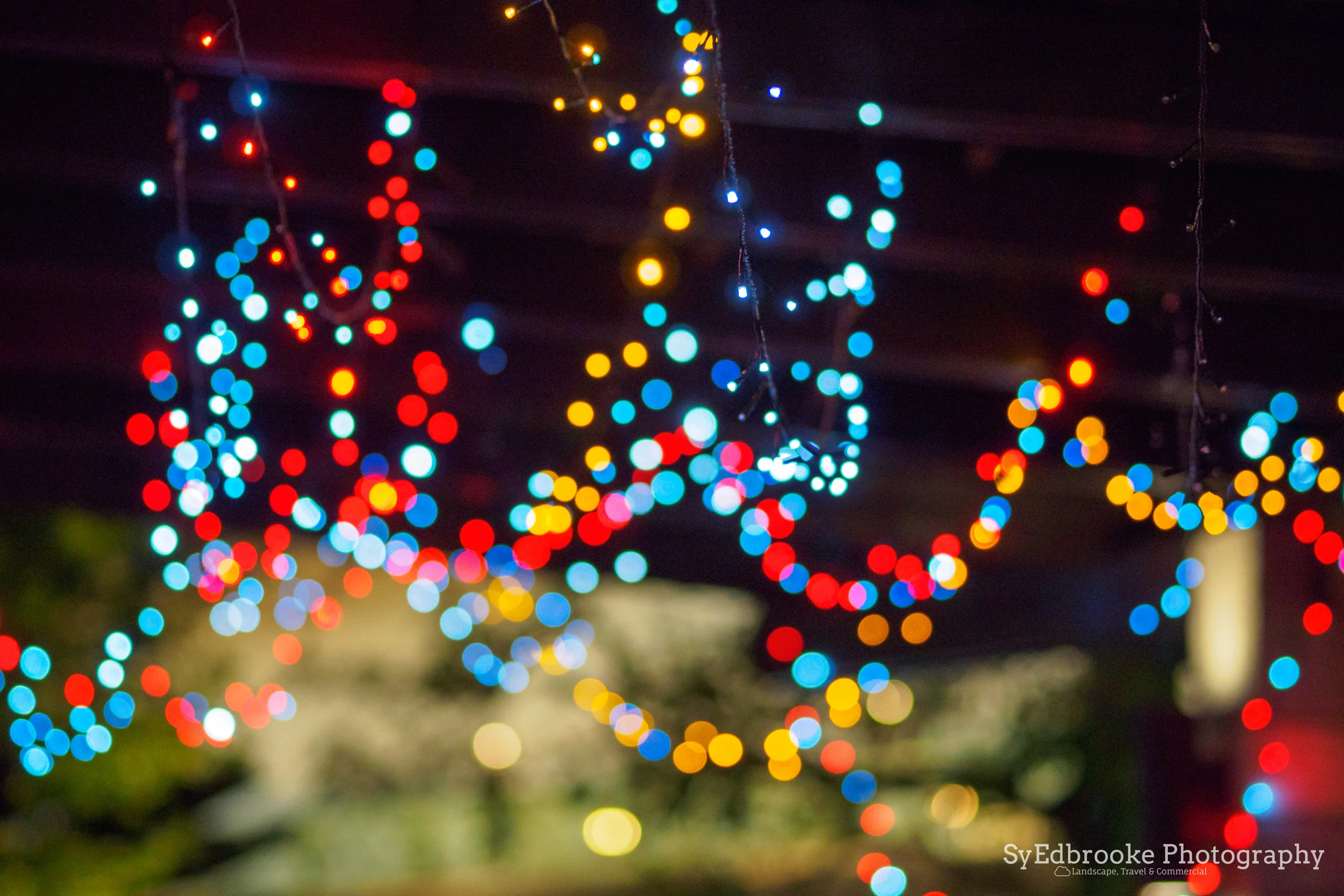 The soft out of focus lights. f1.8, ISO 1600, 1/25, 150mm