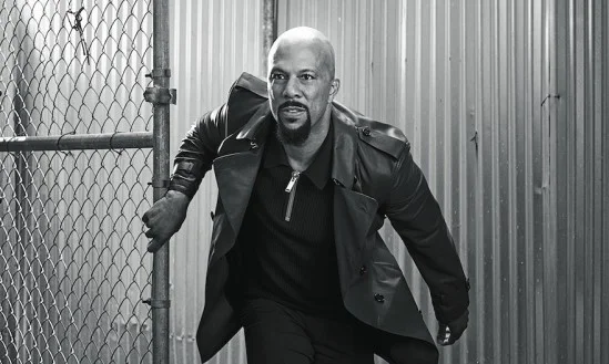 Short leather trench coat in Slate Blue, $3,995, Burberry, Beverly Hills; navy cotton cashmere zip polo, $298, Michael Kors, Beverly Hills; Neoteric bonded pant, $285, Theory, L.A.; Gotham II sneakers, $345, noahwaxman.com.
