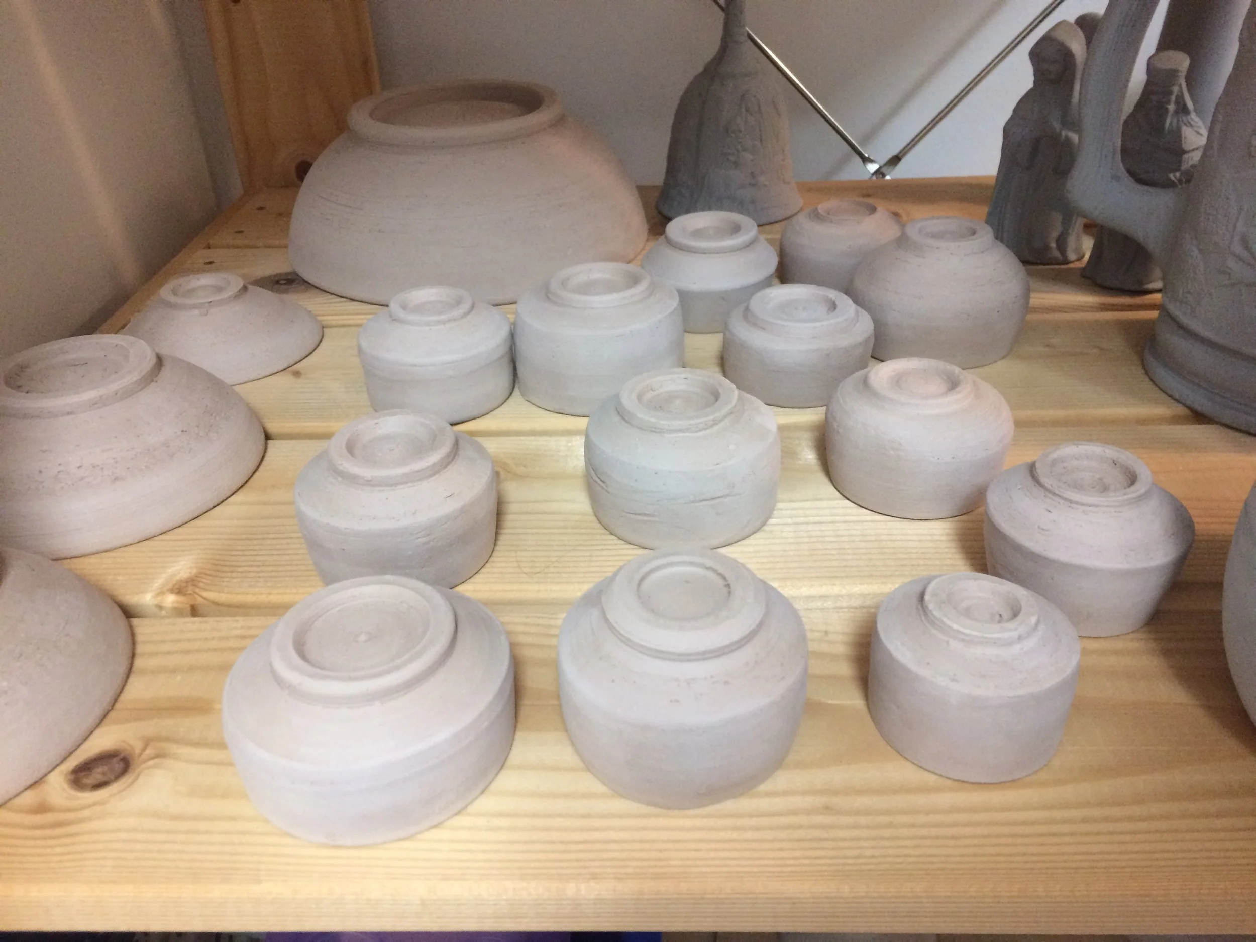  Working on tiny grape juice sipping cups. 