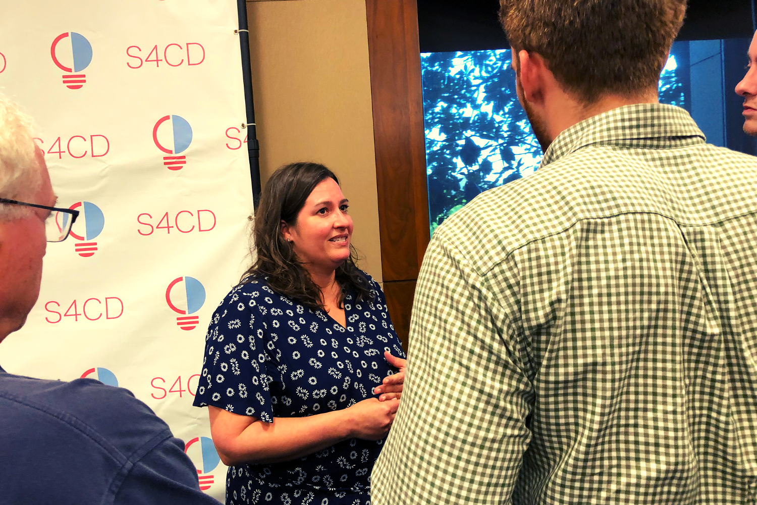 Beth Youra, VP of Luntz Global, interacting with attendees at S4CD’s Congressional briefing.