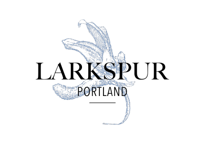 Logo of Larkspur Portland featuring a sketch of a flower.