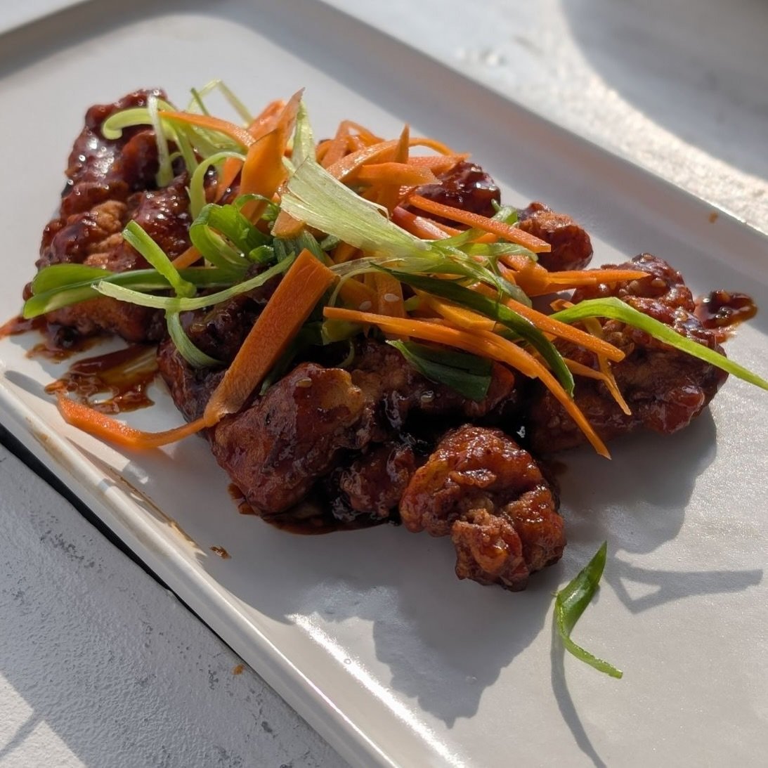 Introducing our Bulgogi Popcorn Chicken🍗✨ 

Crispy popcorn chicken tossed in our house-made Korean Gochujang sauce, perfectly balancing sweet and spicy flavors. It&rsquo;s topped with zesty pickled carrots and fresh scallions for that extra crunch!
