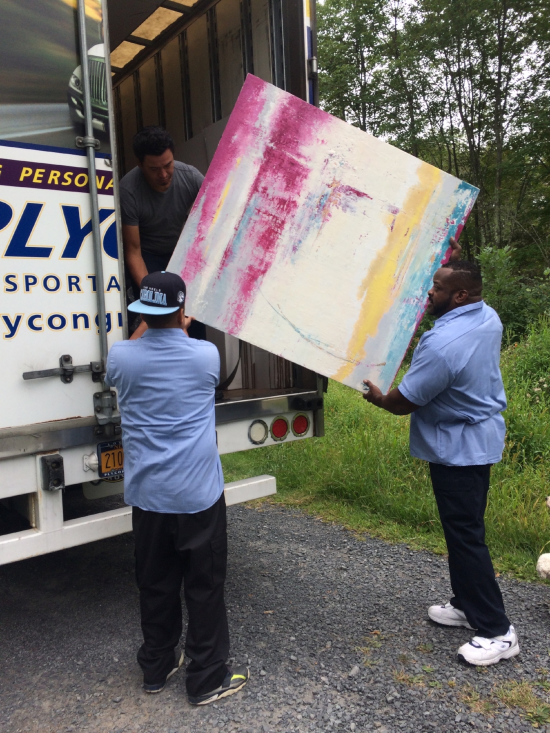 Lisa's painting loading on truck 2.jpg