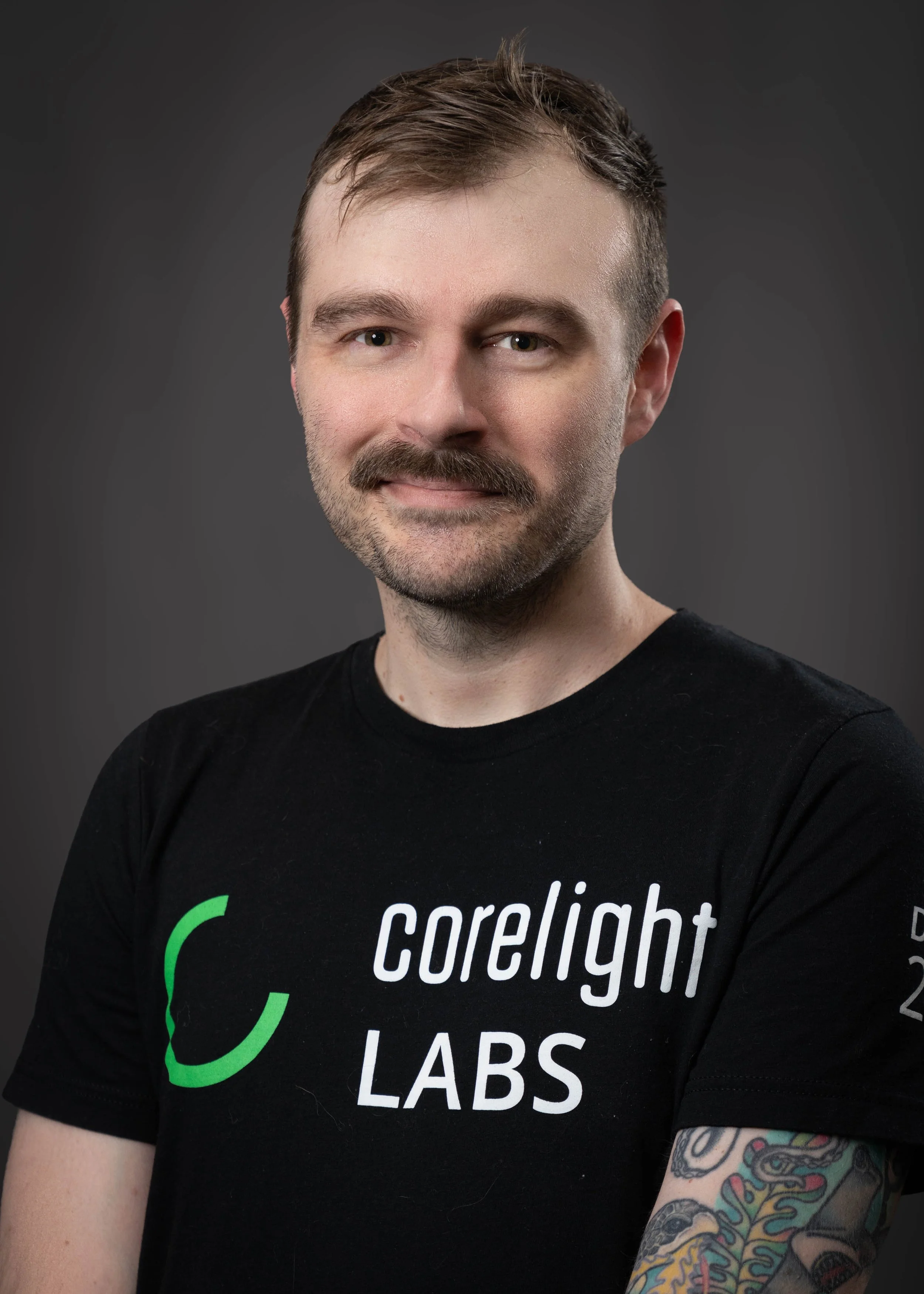 david_burkett_headshot_2026_FINAL.jpg