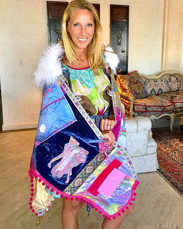 The beautiful @namastrid wearing our original Victoria Phoenix Unicorn Castle Art Cape!