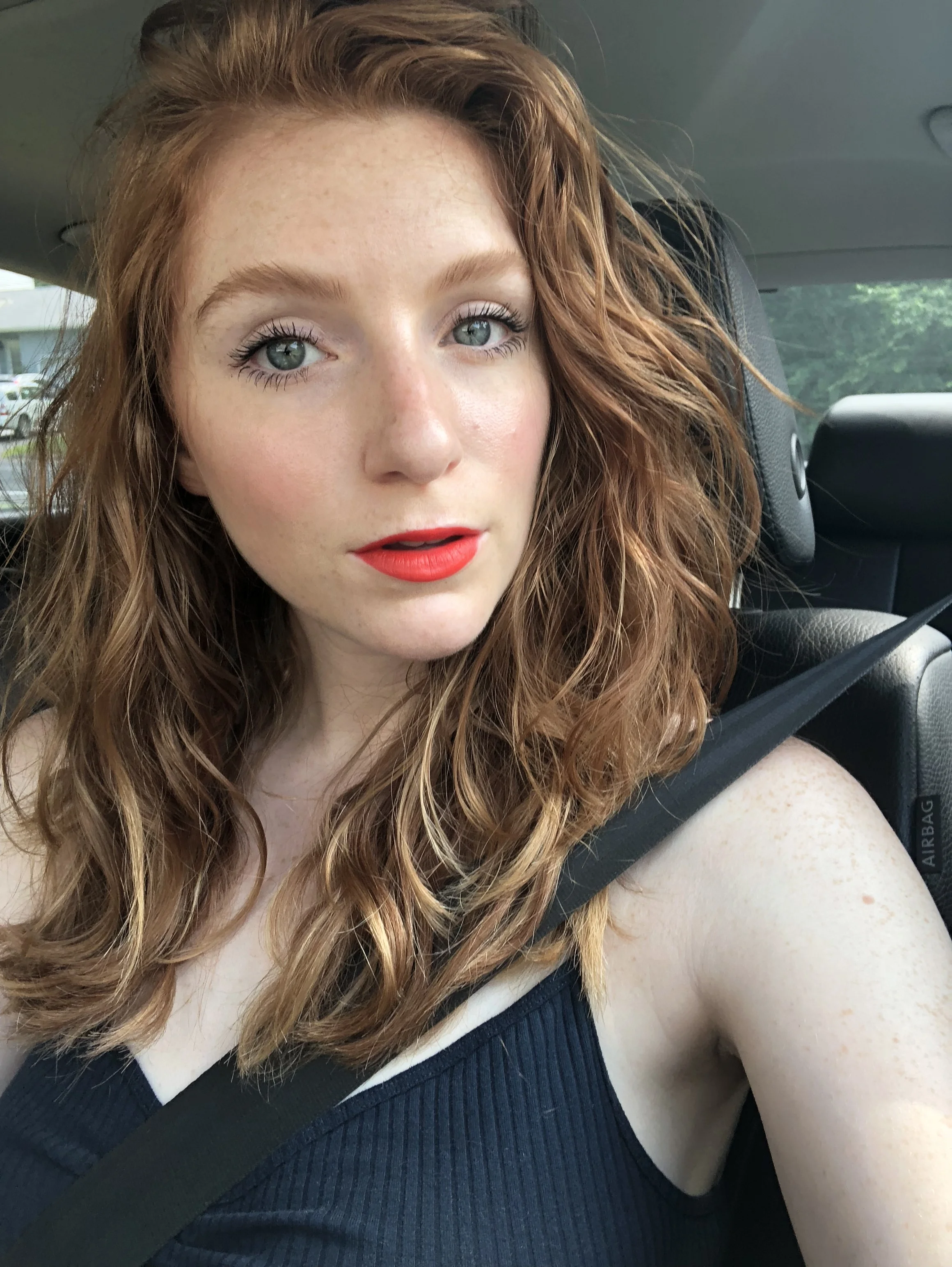 Car selfie in my 4th of July makeup ft. rosy cheeks in Kjaer Weis Blush in Blossoming