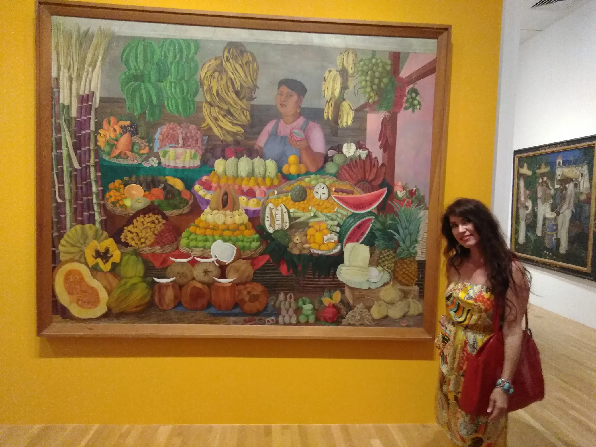 This was one of my favorites. "The Fruit Seller" by Olga Costa. The detail and colors are amazing. And I was so impressed with the bold, bright wall colors for the show. They were such a complement to the art.