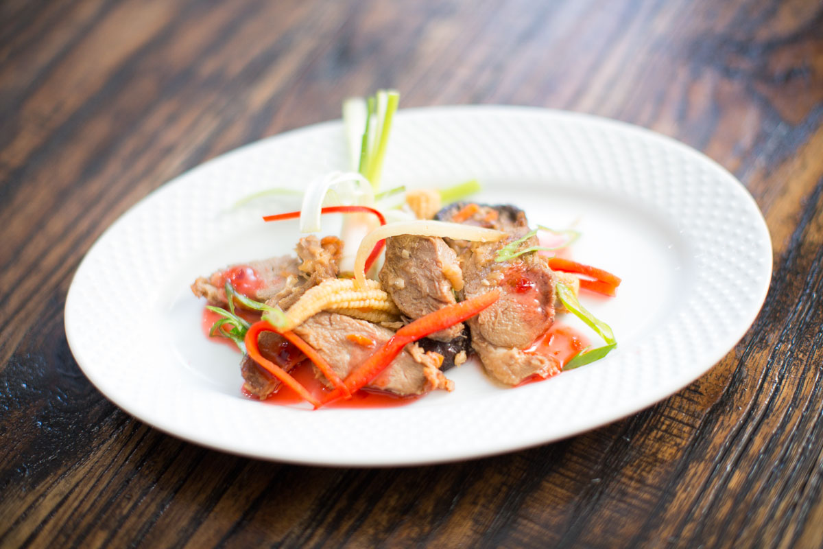 Shredded duck with Asian Vegetables and Pomegranate sauce 
