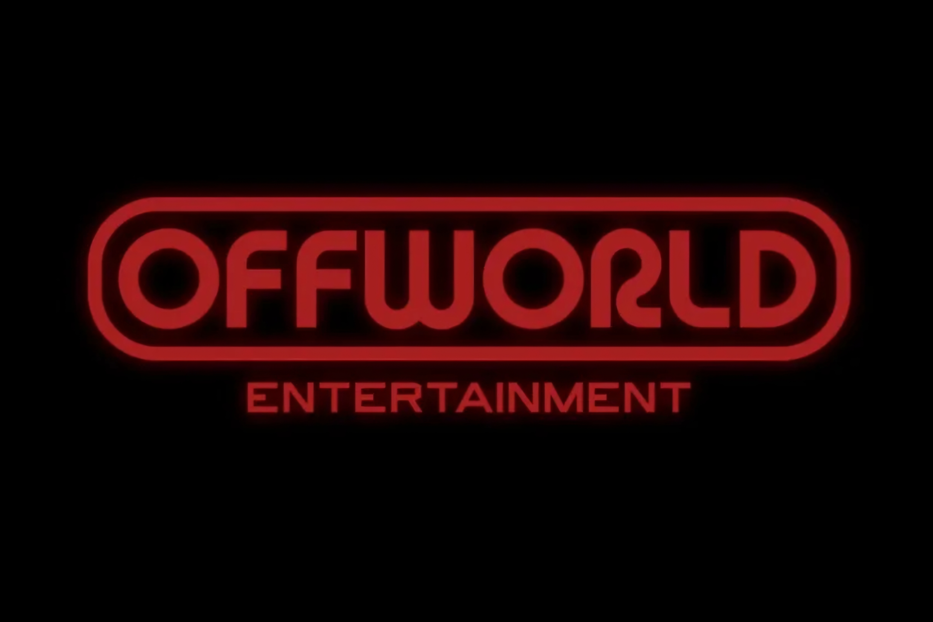 Neon red sign displaying the word 'OFFWORLD' with the word 'ENTERTAINMENT' underneath.