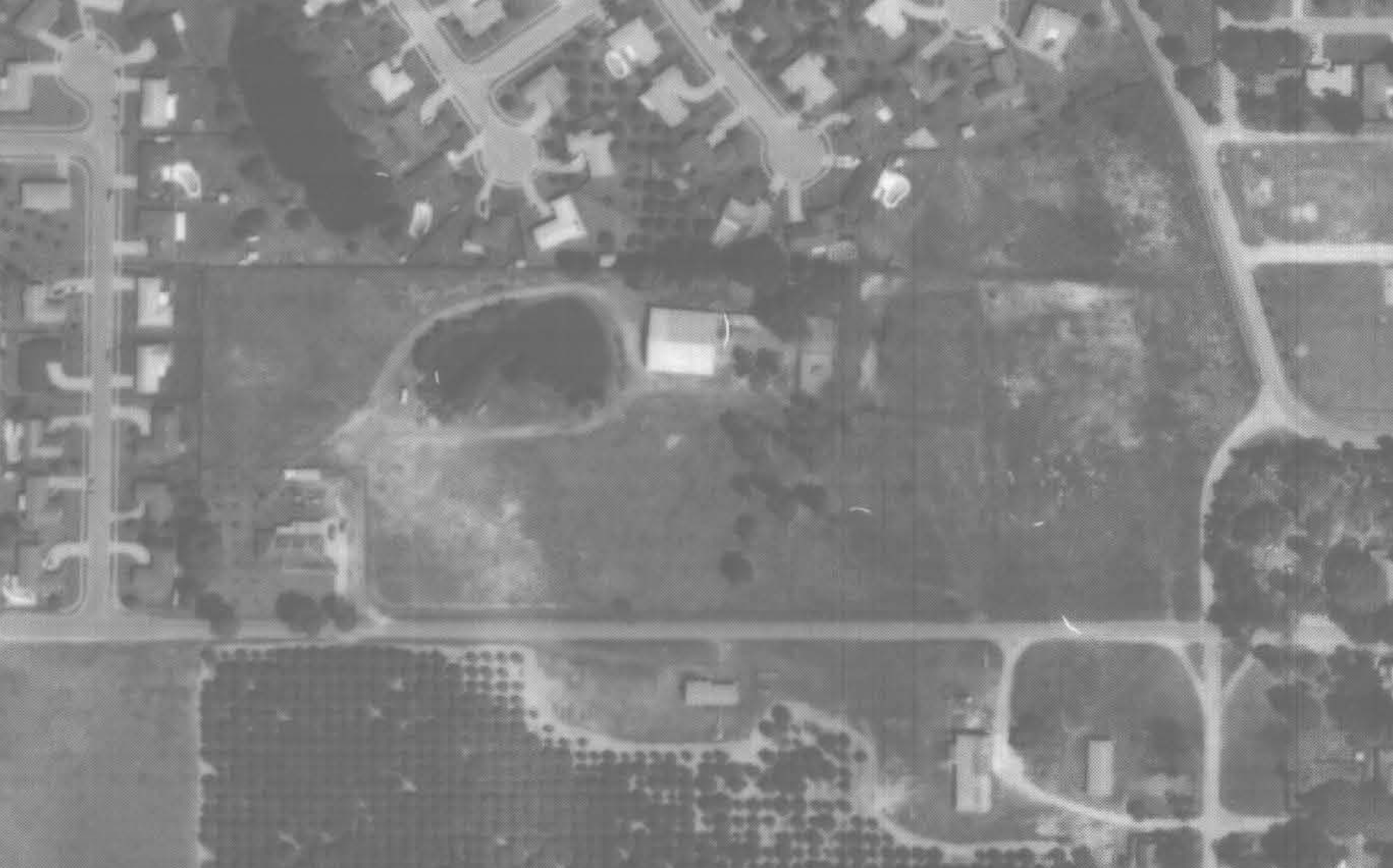 Aerial photo of the Reiter family homestead and what is now Reiter Park (on the right), as seen in 1980.