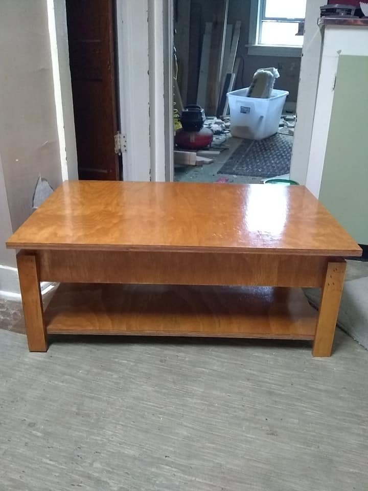 Coffee table with high gloss top