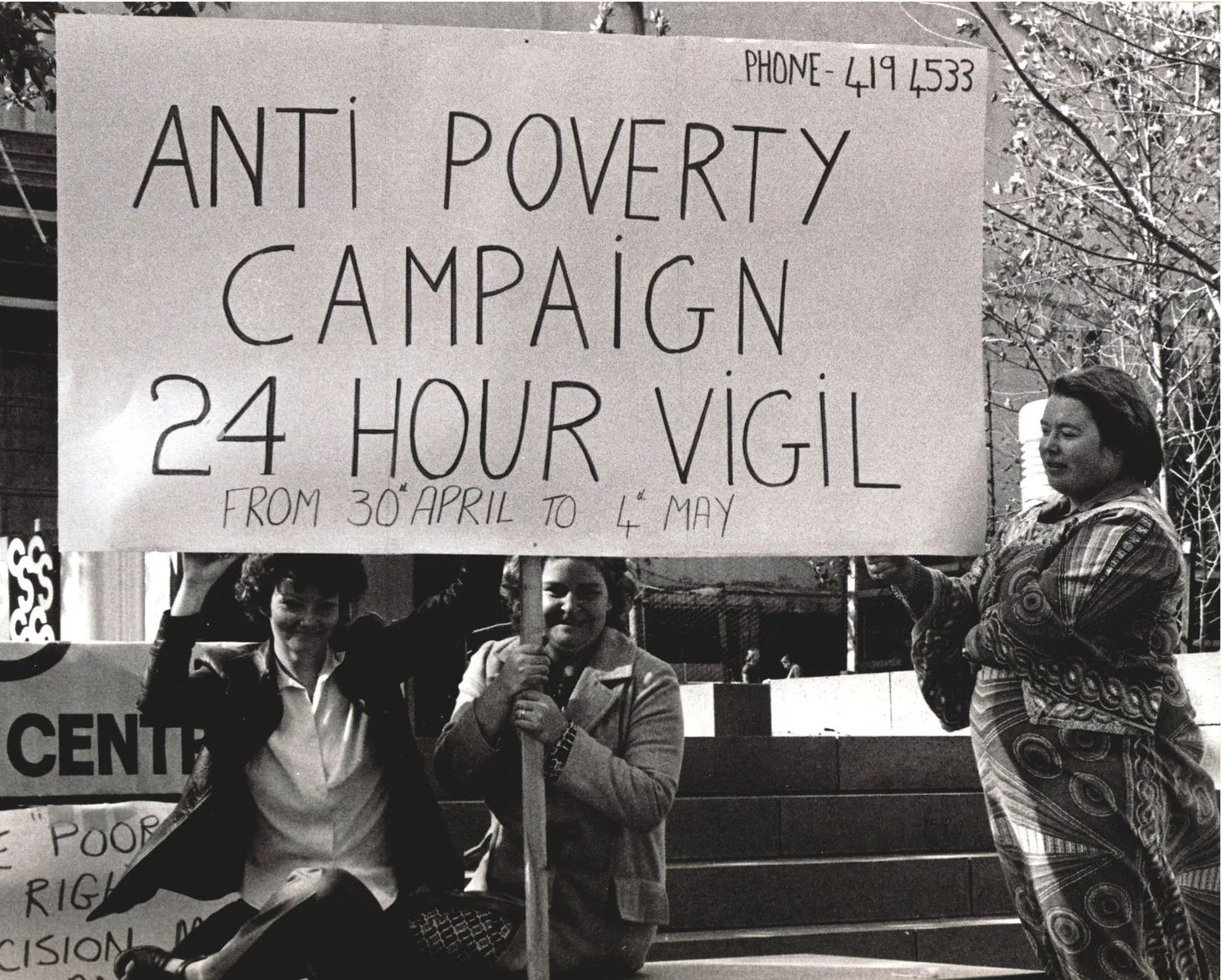 3-people-holding-banner_Anti-Poverty-Campaign-24-hour-vigil-from-30th-April-to-4th-May_1979.jpg