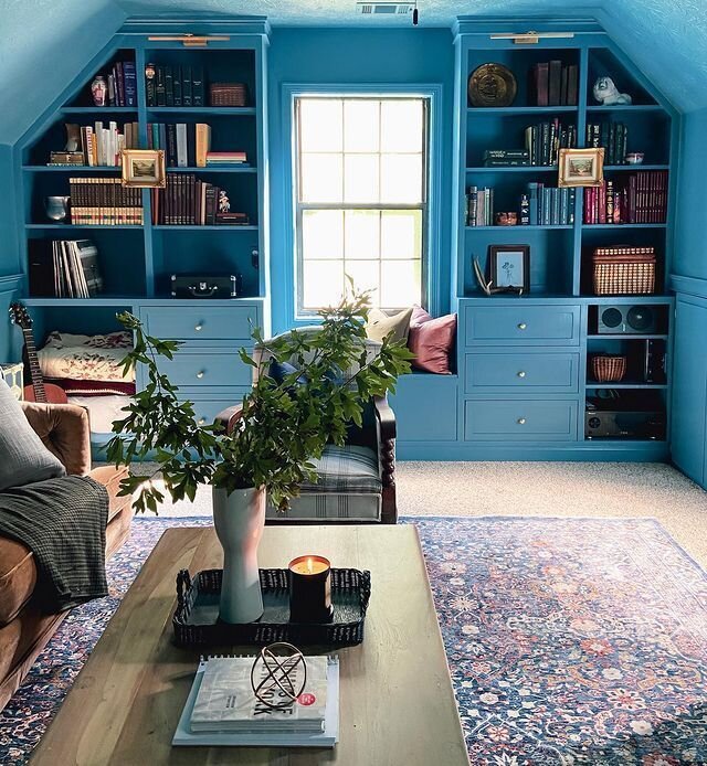 This gorgeous study space is by @laurenshandmadehome from the spring '22 ORC. Lauren built the bookcases completely from scratch! The window allowed her to create a window seat-- which is always a hit-- and the pitch of the roof creates a really inte