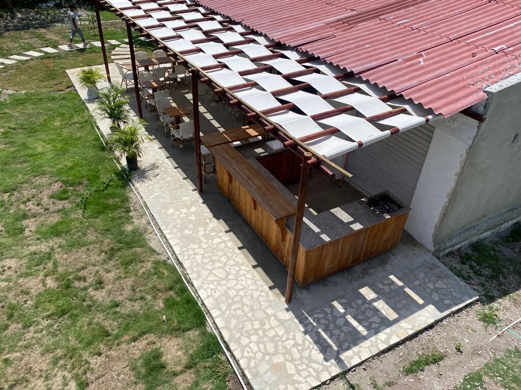 Elevated view of the bar/patio area almost done