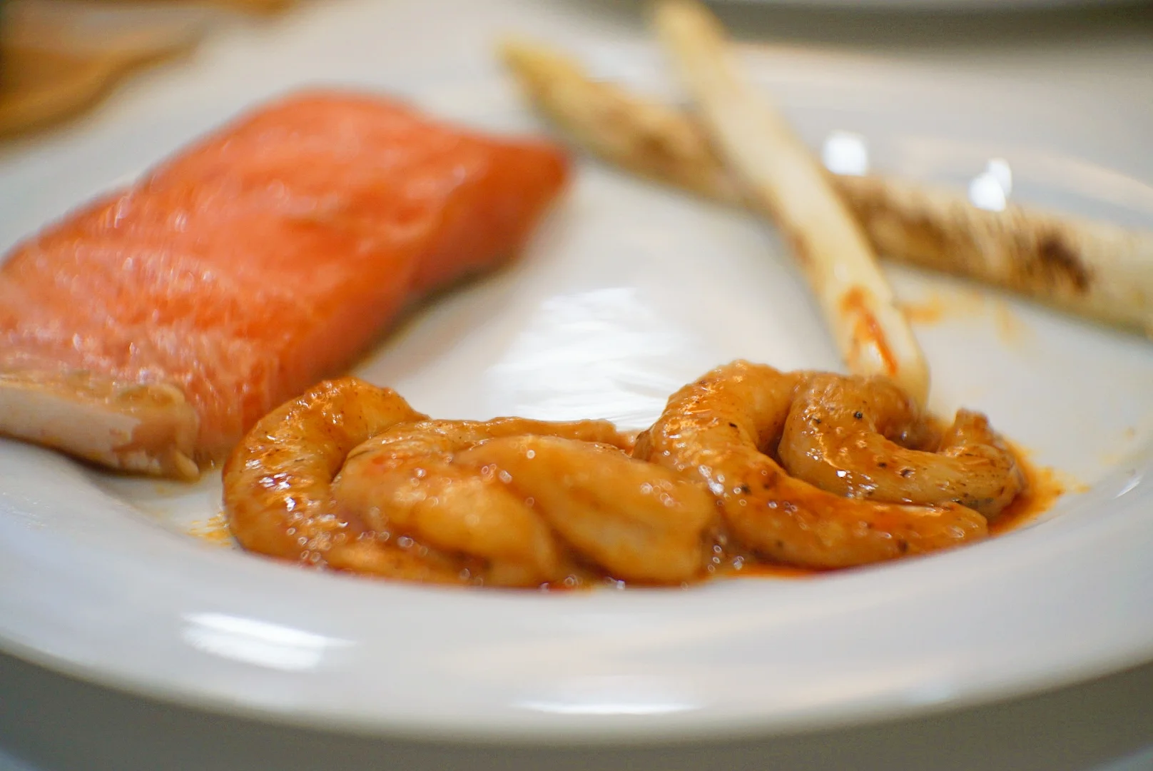 Clockwise from left: soy miso sous vide salmon, air-fried white asparagus and the highlight, Spanish-style sous vide prawns.