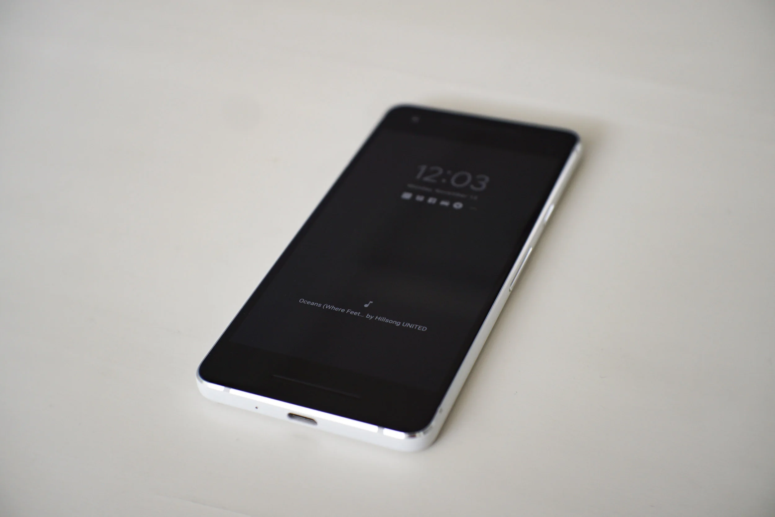 After you "lock" the phone, the lockscreen is always on - showing you the time, notification icons and what song is now playing.