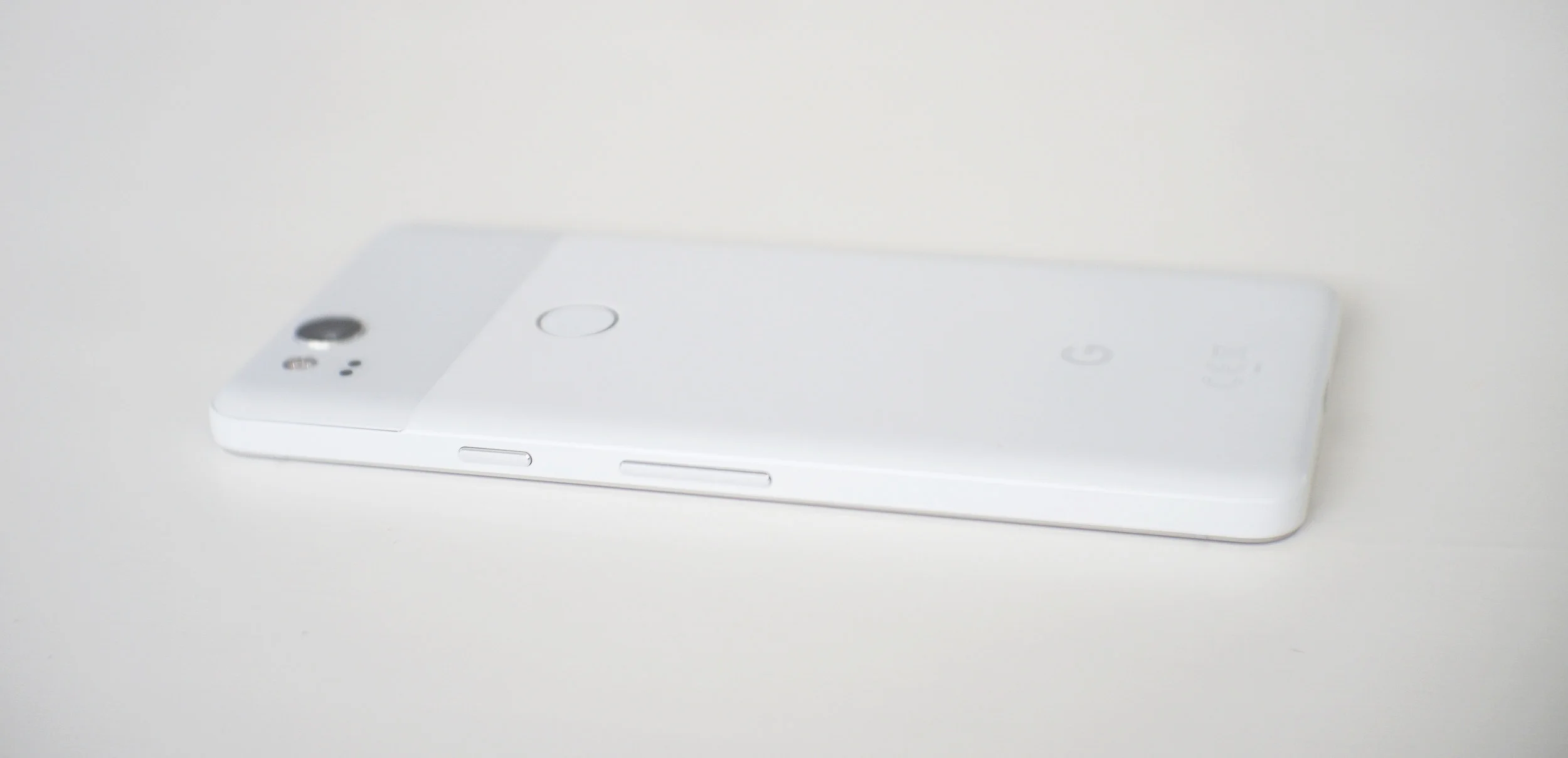 The power button (left) and volume buttons (right) are on the right side of the phone.