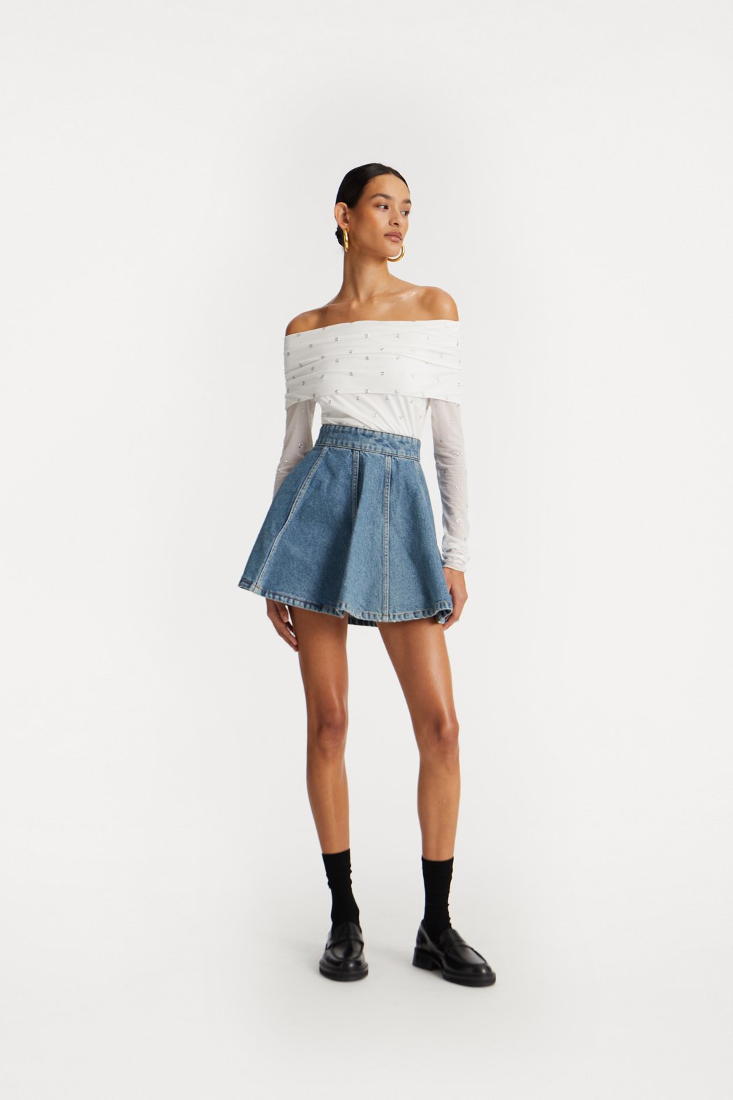 ROTATE_PF25_111124_114258400_Bright White_Off Shoulder Top_Model_ 1_1140783054_Vintage Blue, Denim_Denim Mini Skirt_Model_ 1_1078_lr.jpg