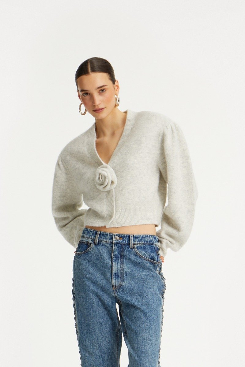 rotate_pf25_121124_1142762344_snow_white_knit_puffsleeve_cardigan_model__1_1145953054_vintage_blue_denim_laced_straight_leg_jeans_model__1_3951_lr_crop.jpg