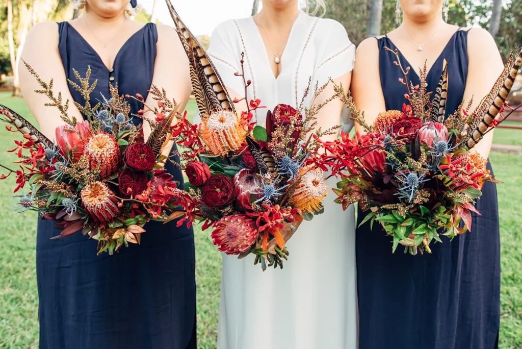 Copy of bride and bridesmaids bohemian inspired bouquets to complement navy dresses