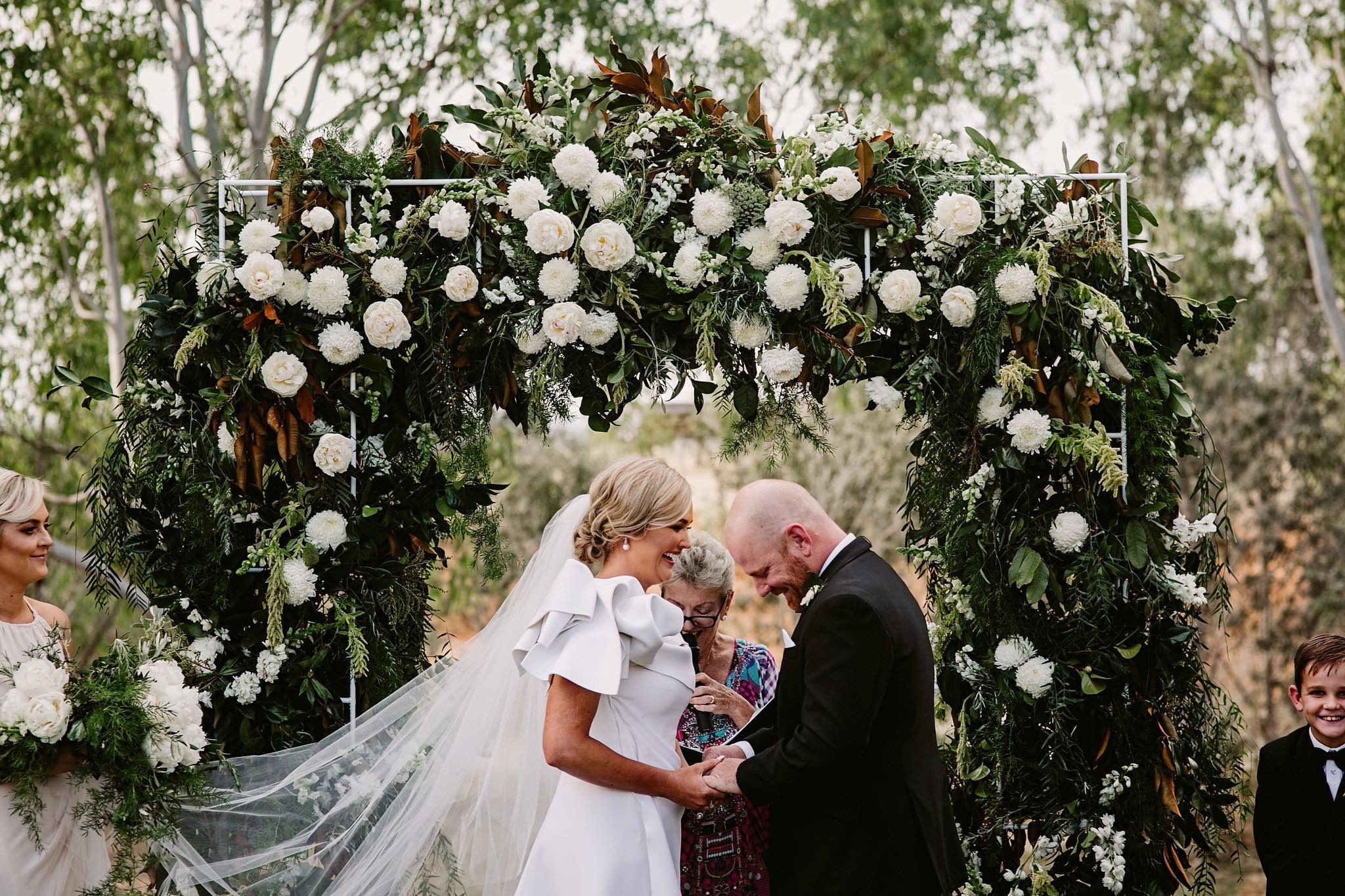 wedding arbour creating a stunning ceremony backdrop
