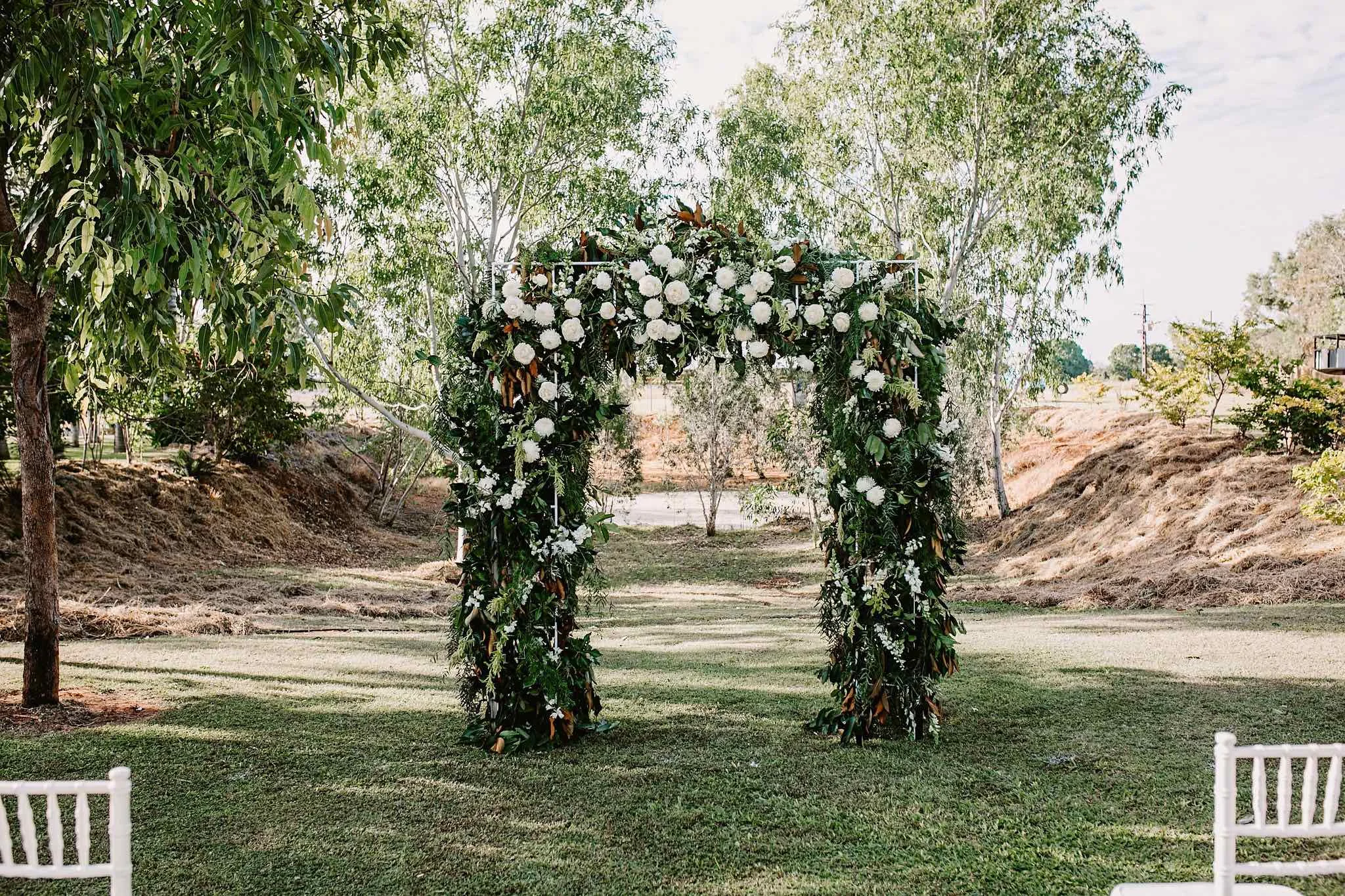outback wedding ceremony arbour flowers
