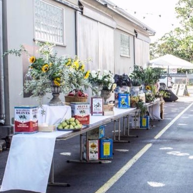 grey urn flowers for the grazing table at Parap Fine Foods street party