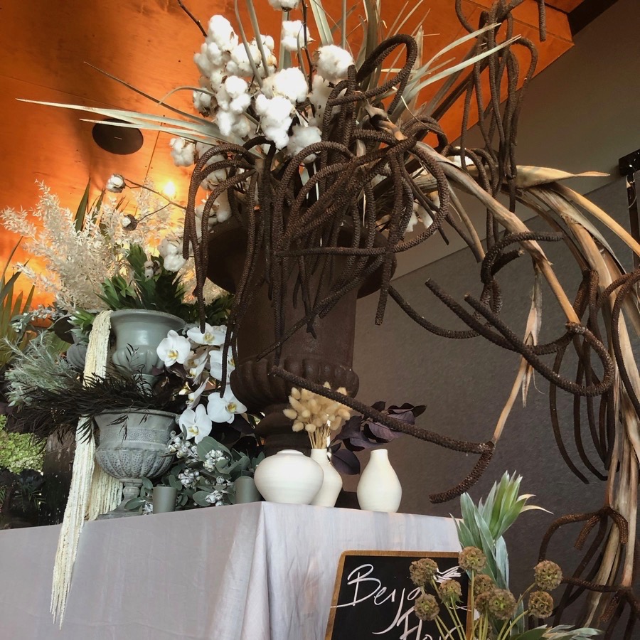 collection of rust patina and stone urns for floral styling in Darwin and Northern Territory from Darwin florist, Beija Flor