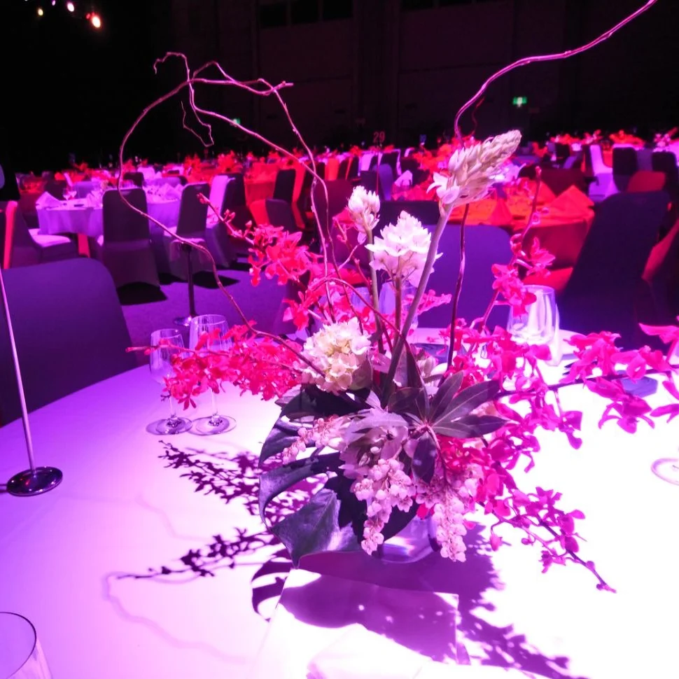 Corporate event flower centrepieces for Inpex event at Darwin Convention Centre.