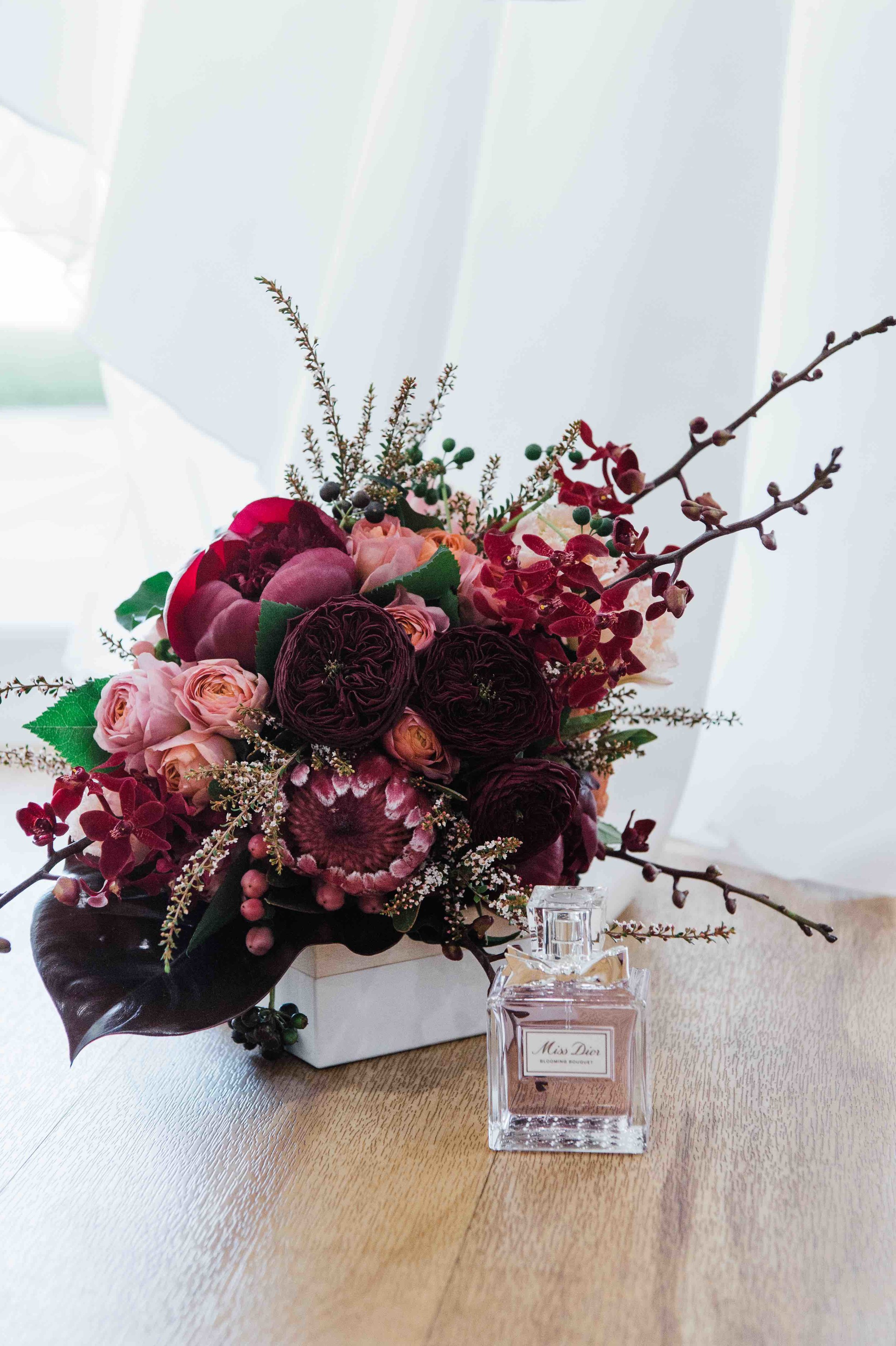 Copy of this brides bouquet has it all natives, peonies and tropical orchids and leaves