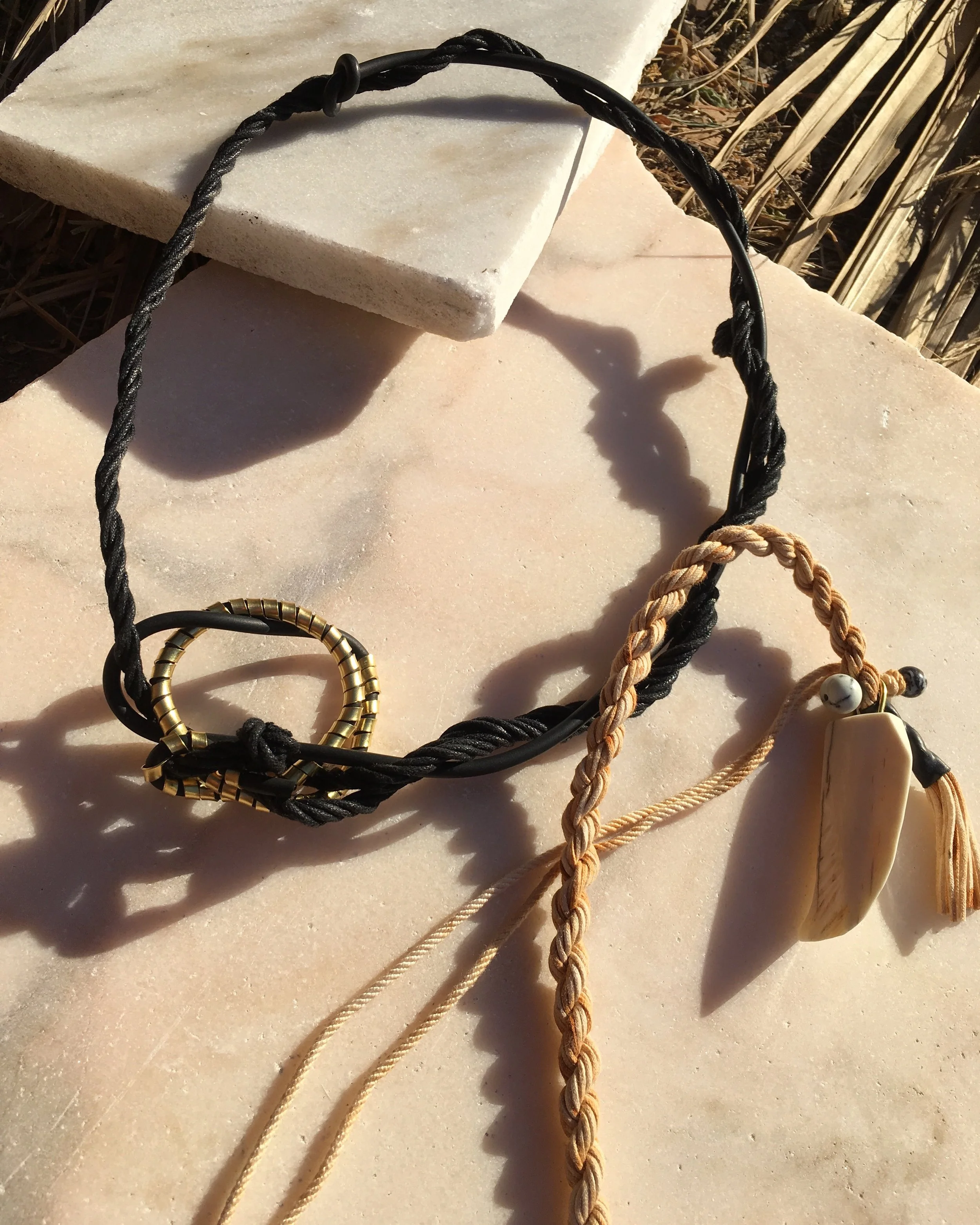  I was invited to share a collection of jewelry to be shown at the Old Navy corporate head quarters store. The collection was a black and white story that featured prints inspired by safari. I wanted to play with yarns that I had rusted and use black
