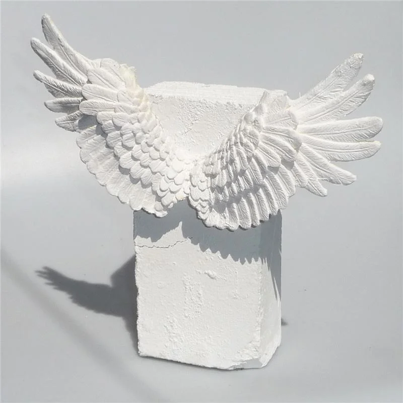 Yes-No-Maybe--Winged-Brick-Sculpture-White-on-White-back-800x800.jpg