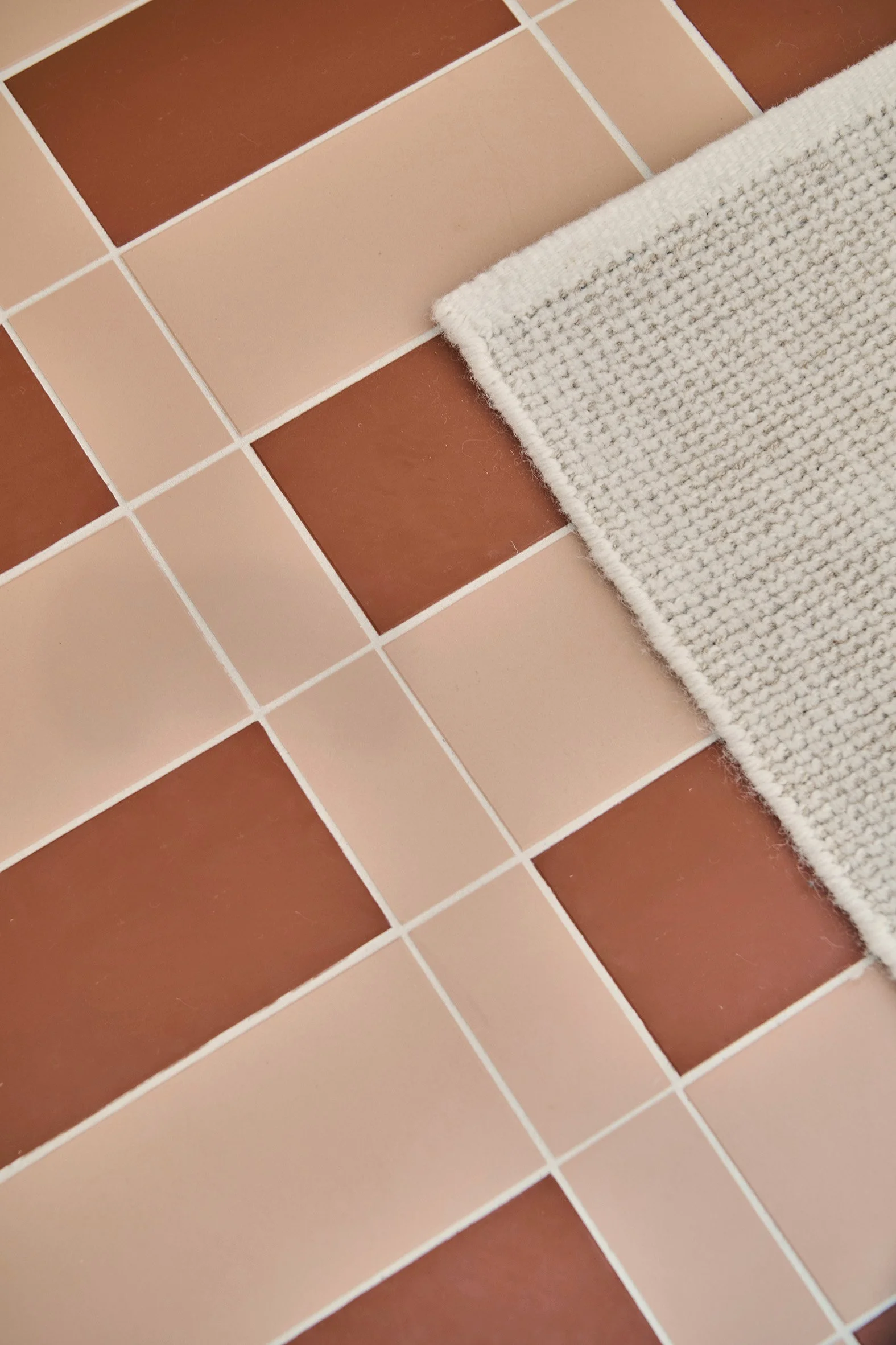 Winkelmans pink and terracotta tile flooring at KBF Warehouse.