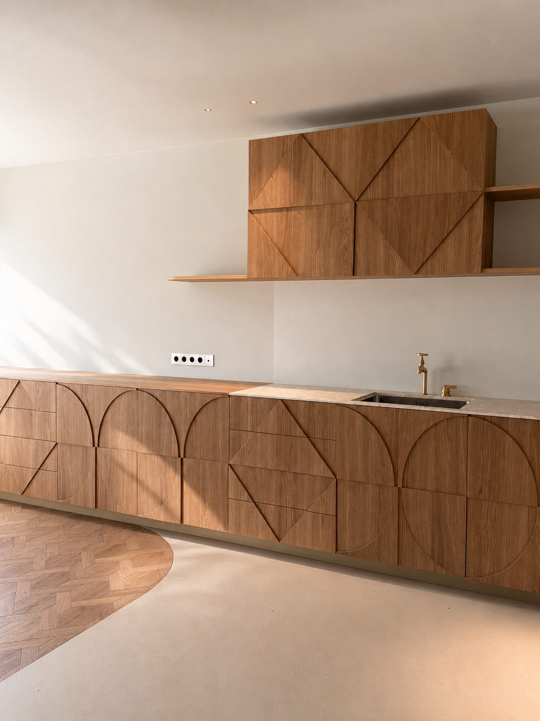 26. Custom atelier sideboard: Long studio credenza featuring intricate three-dimensional geometric wood-carved details paired with a vintage-style Studio Ore faucet.