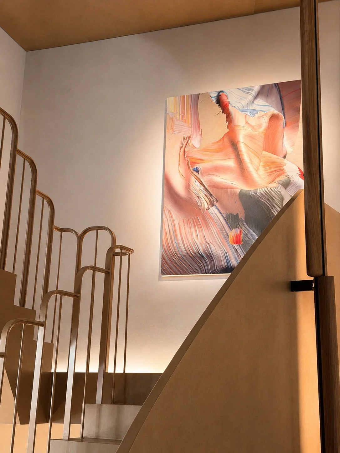 24. Meridiana staircase lighting: Custom Meridiana lighting system designed with Viabizzuno, gracefully tracing the sculptural geometry of the stairs alongside a bespoke handrail.
