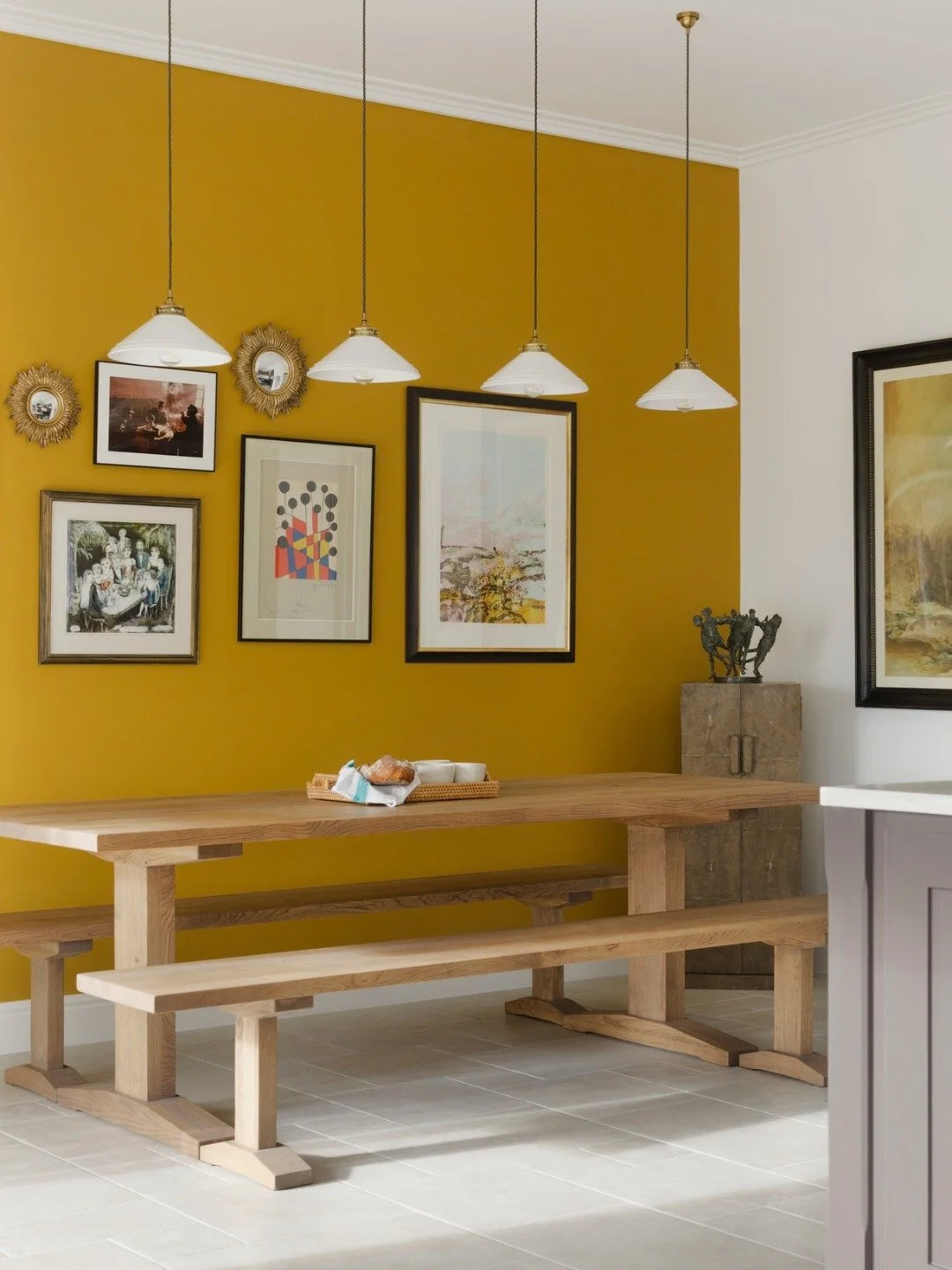 At the heart of this Day Room is the vibrant yellow dining area, where the rich tone of Paint &amp; Paper Library's Muga creates a warm and uplifting focal point within the larger space.

The colour defines the dining zone, bringing energy and warmth