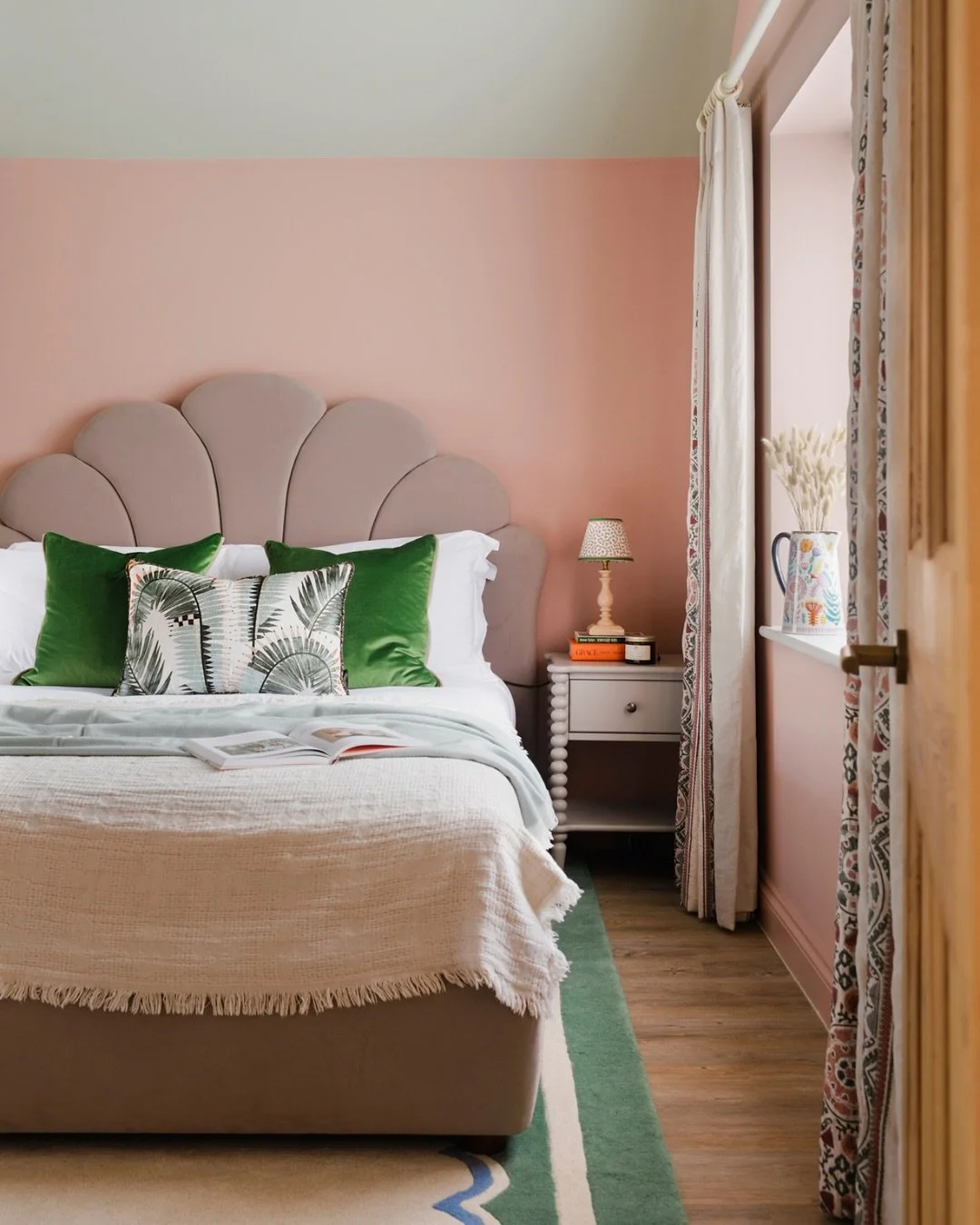 Our brief for this bedroom was &lsquo;soft greens, pinks and botanicals&rsquo; 🌿 

With the vaulted ceiling, we introduced a contrast colour on the ceiling (Leek &amp; Potato by @williamyeoward) kept walls and woodwork in Almost Nude, and layered to
