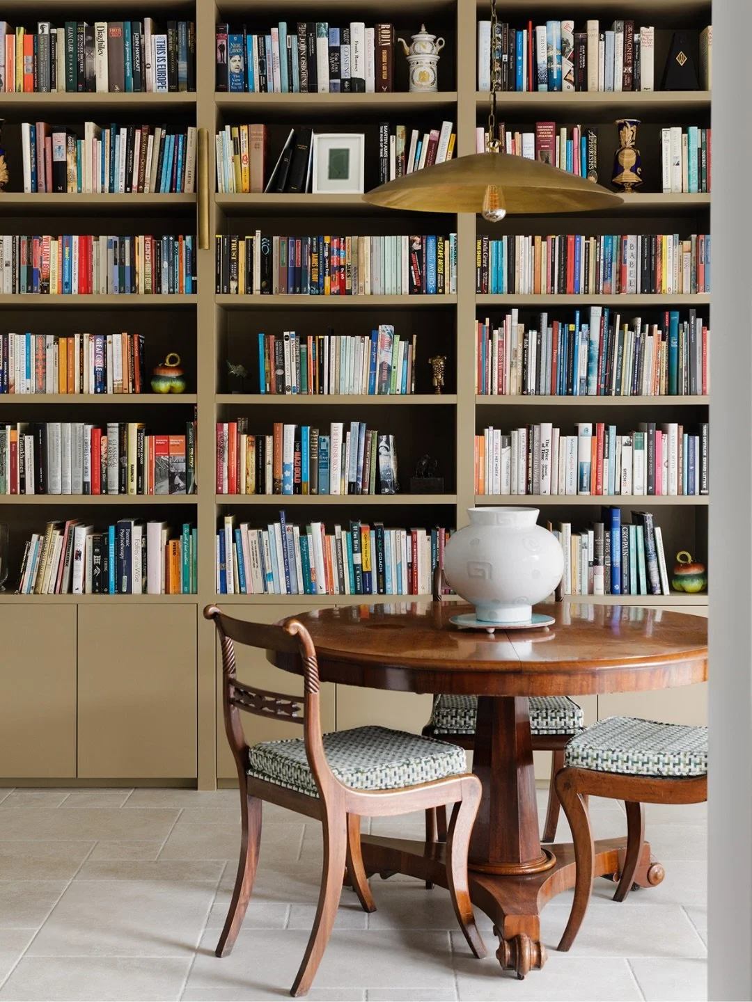 We were brought in to design this incredible home on the cusp of our clients moving in together ~ decades of stories, beautiful objects, and collections coming together under one roof. One such collection was their books, to be merged harmoniously in