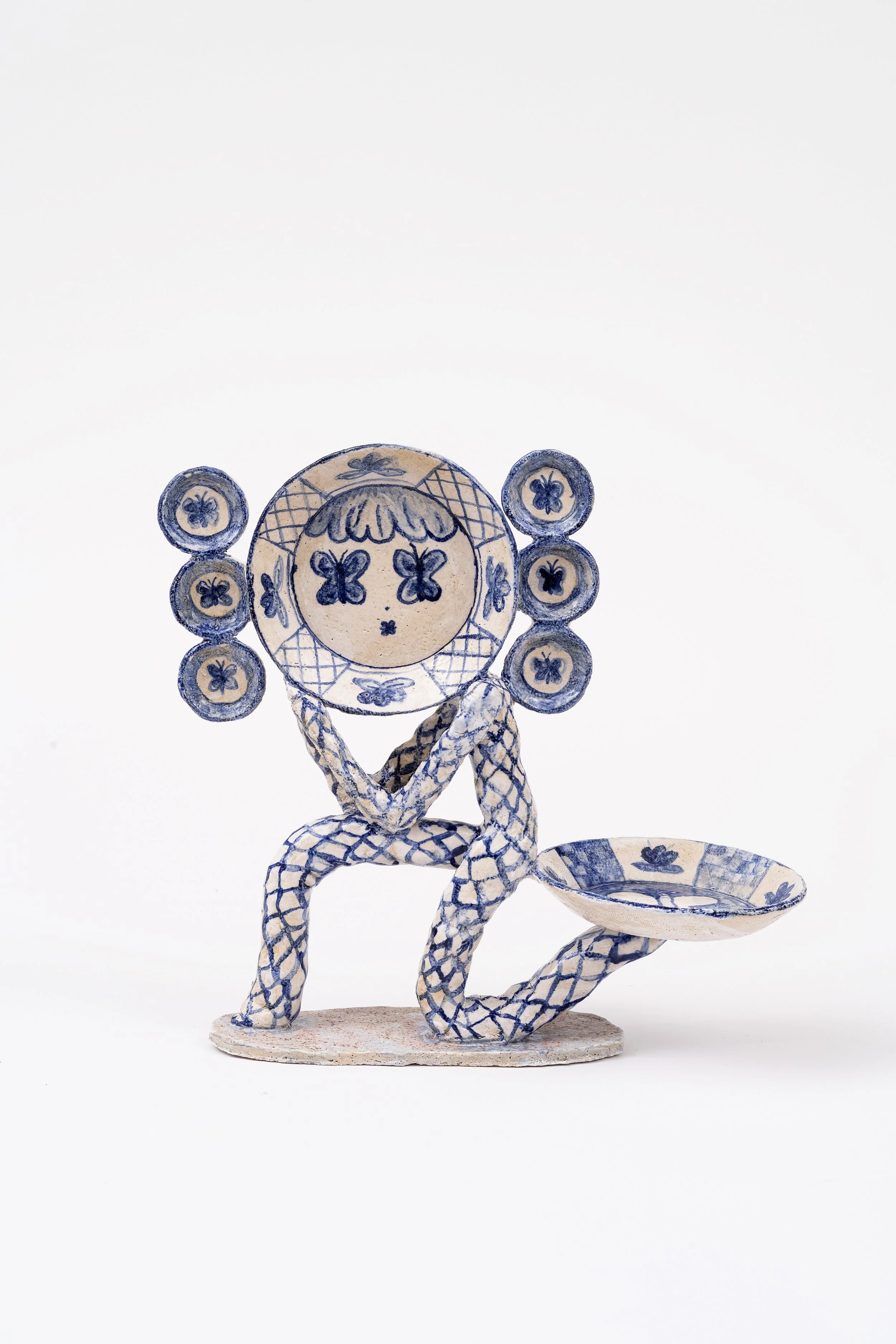   Kneeling Dude with Plates , 2023 Photo by Gary Mamay courtesy of Strollgarden 