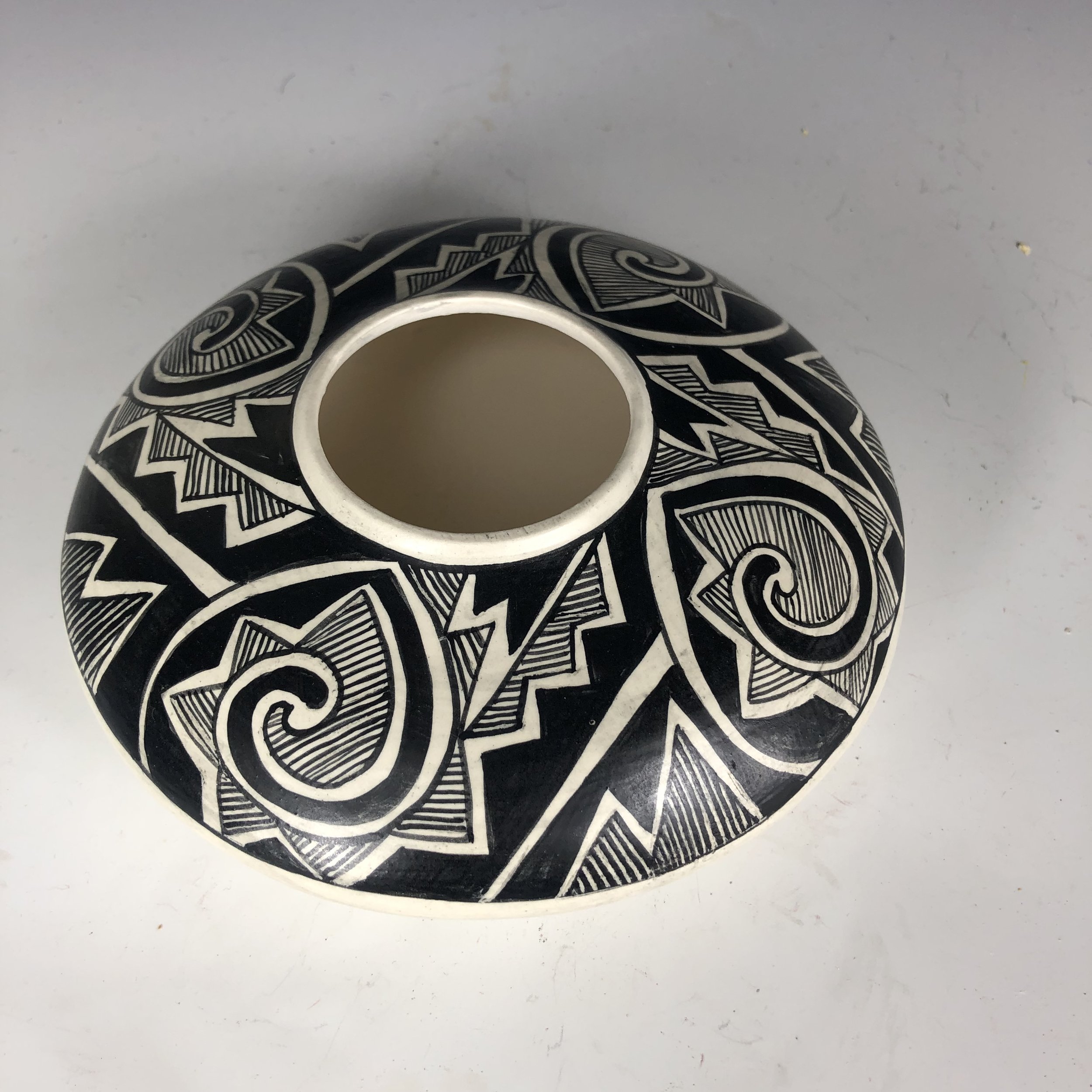 Mesa verde black on white ceramic seed jar