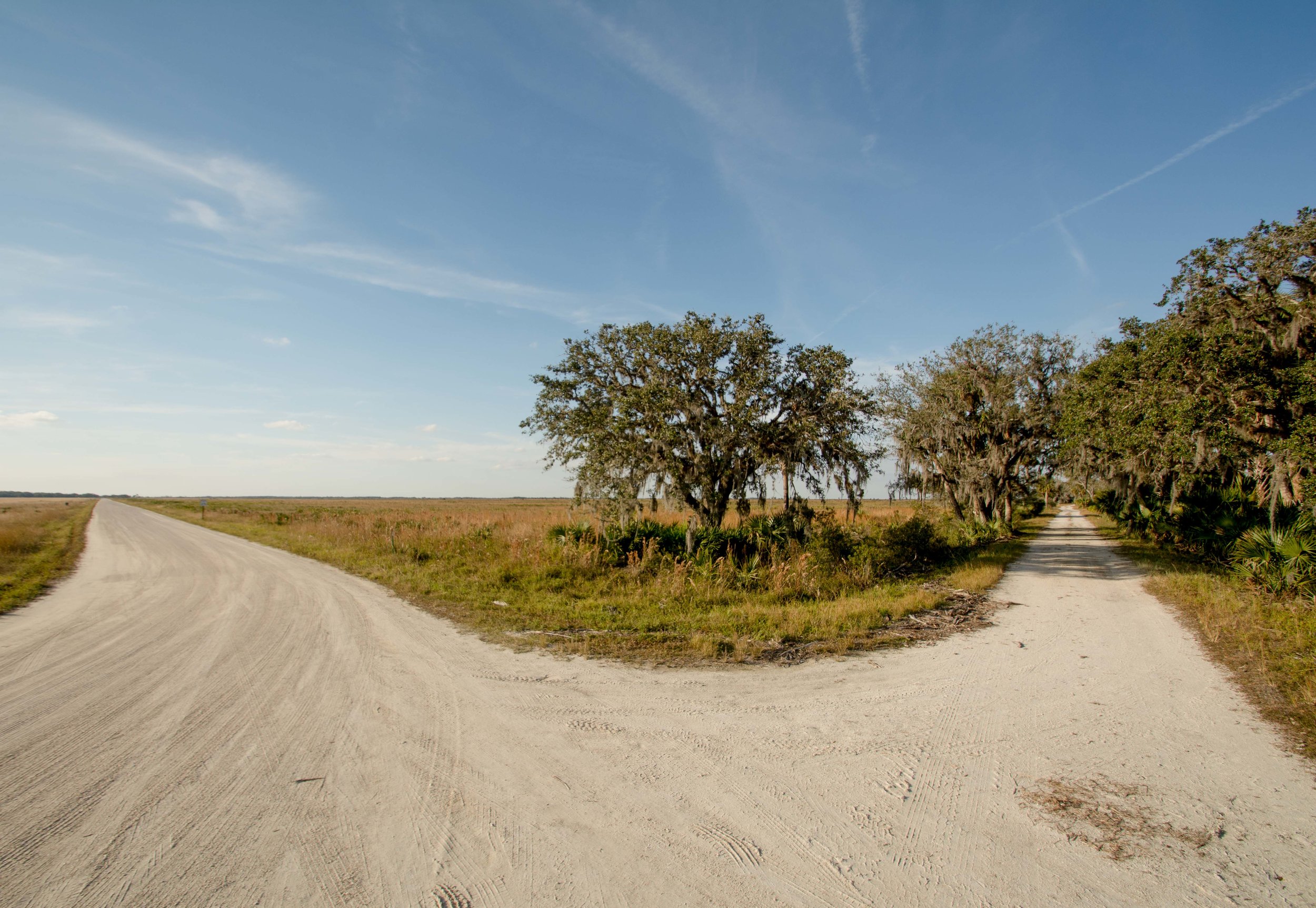  Communities that opt to keep a road unpaved aren't just doing it for the aesthetics.  Paving a road is far from cheap. &nbsp; 