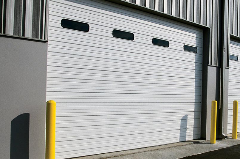 Steel Sectional Doors. We carry both insulated and non-insulated sectional steel doors.