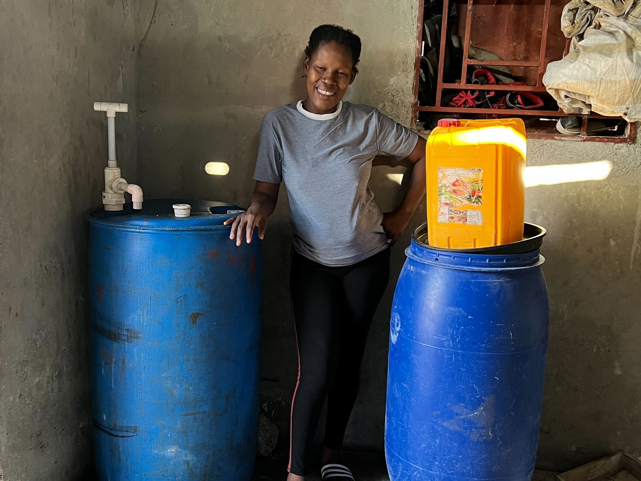  Another WORK family who’s been inspired by our entrepreneurs is Gertha. Upon learning about our Small Business Program and the success of our participants, Gertha saved up a small amount of money to start her business selling oil to the community. T