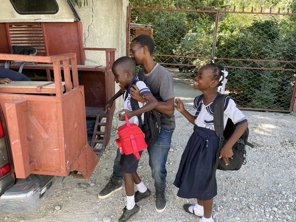  The tap tap school bus was started when we learned how difficult it is for some of our kids to get to school. Imagine a 12-year old spending 90 minutes each morning and afternoon navigating 5 different rides to get an education. That’s what some of 
