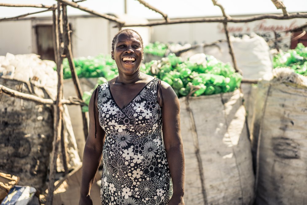  This is Nadine, one of our first collection center owners, and a leader in our network. She’s one of our highest performers. With her business, she supports over 50 collectors to make an income to put food on the table for their families.  