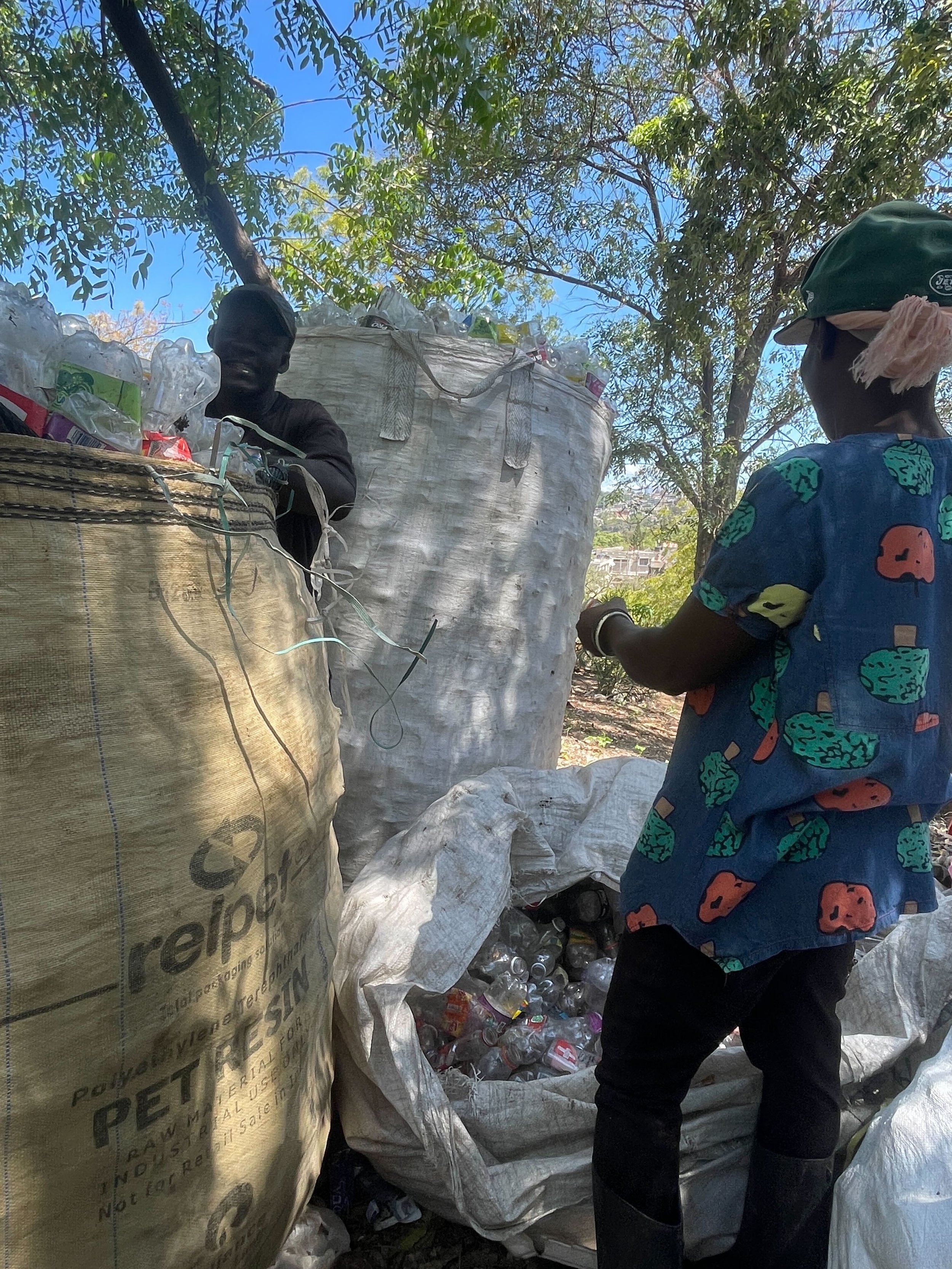  Here are two center employees filling a super sack for transport to our recycling partner. This means they’ll get paid for the material and the center can purchase more material from their collectors.  