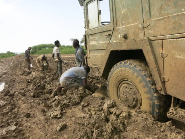 Persistence-and-sweat-equity-pay-off-when-delivering-medicines-during-the-rainy-season.-600x450.jpg