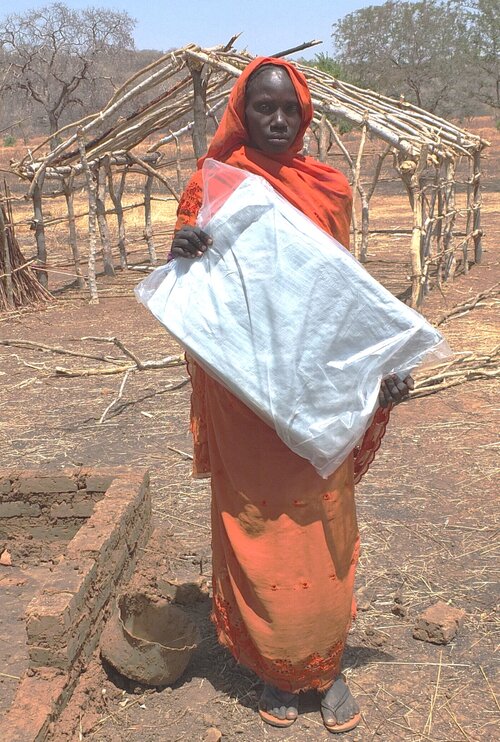 A recent returnee with a shelter tarp.