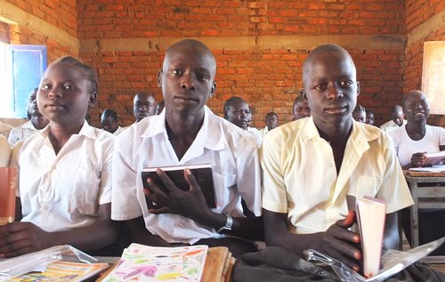 School children treasure their new Bibles.